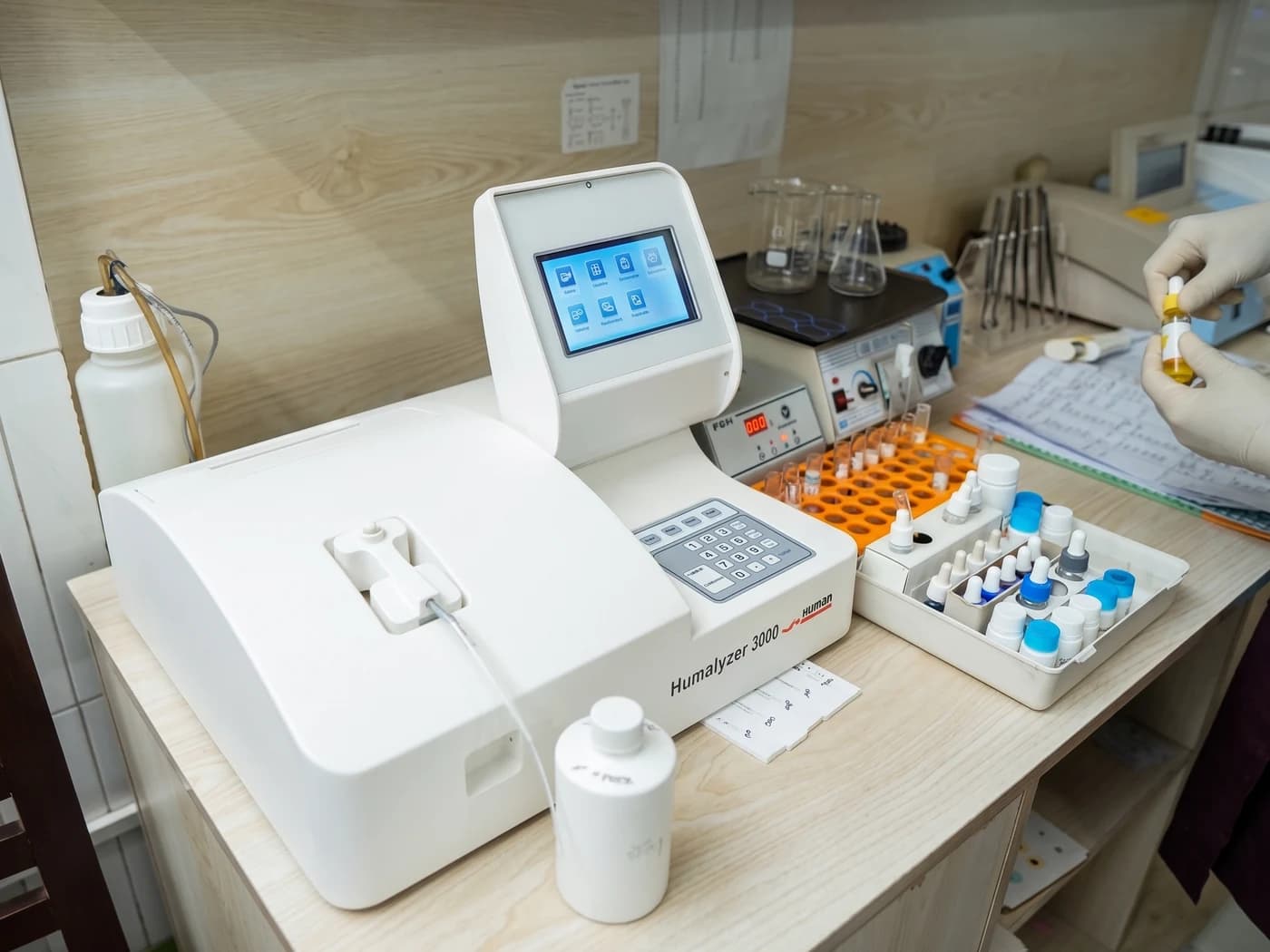 HumaLyzer 3000 biochemistry analyser on the laboratory bench at Dhaka Clinic, Tangail