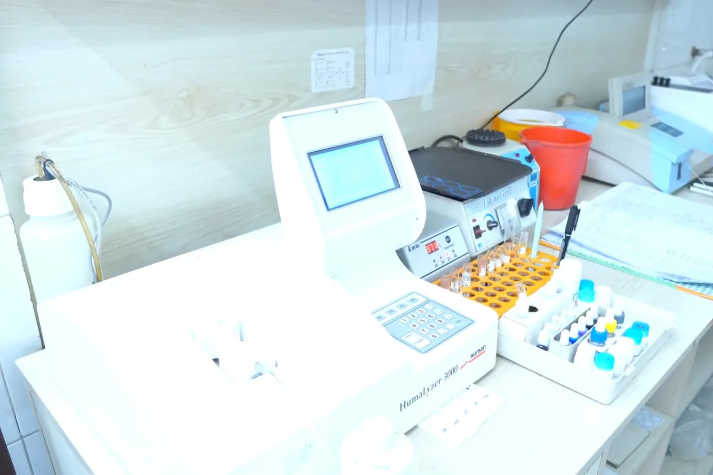 Laboratory bench and analysers in the pathology department at Dhaka Clinic, Tangail