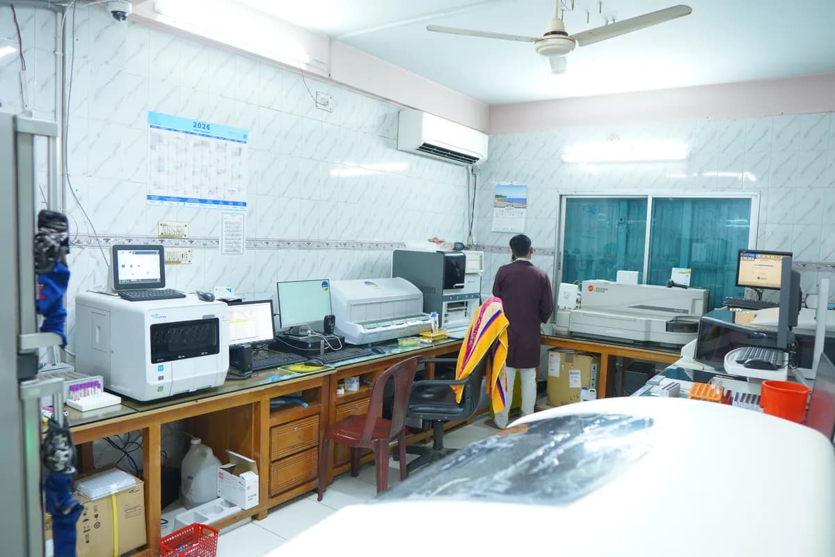 The biochemistry laboratory at Dhaka Clinic, Tangail, with analysers along the bench