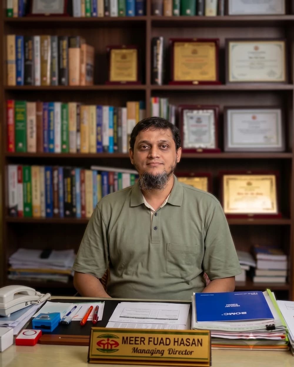Meer Fuad Hasan, Managing Director of Dhaka Clinic & Nursing Home, at his desk in Tangail
