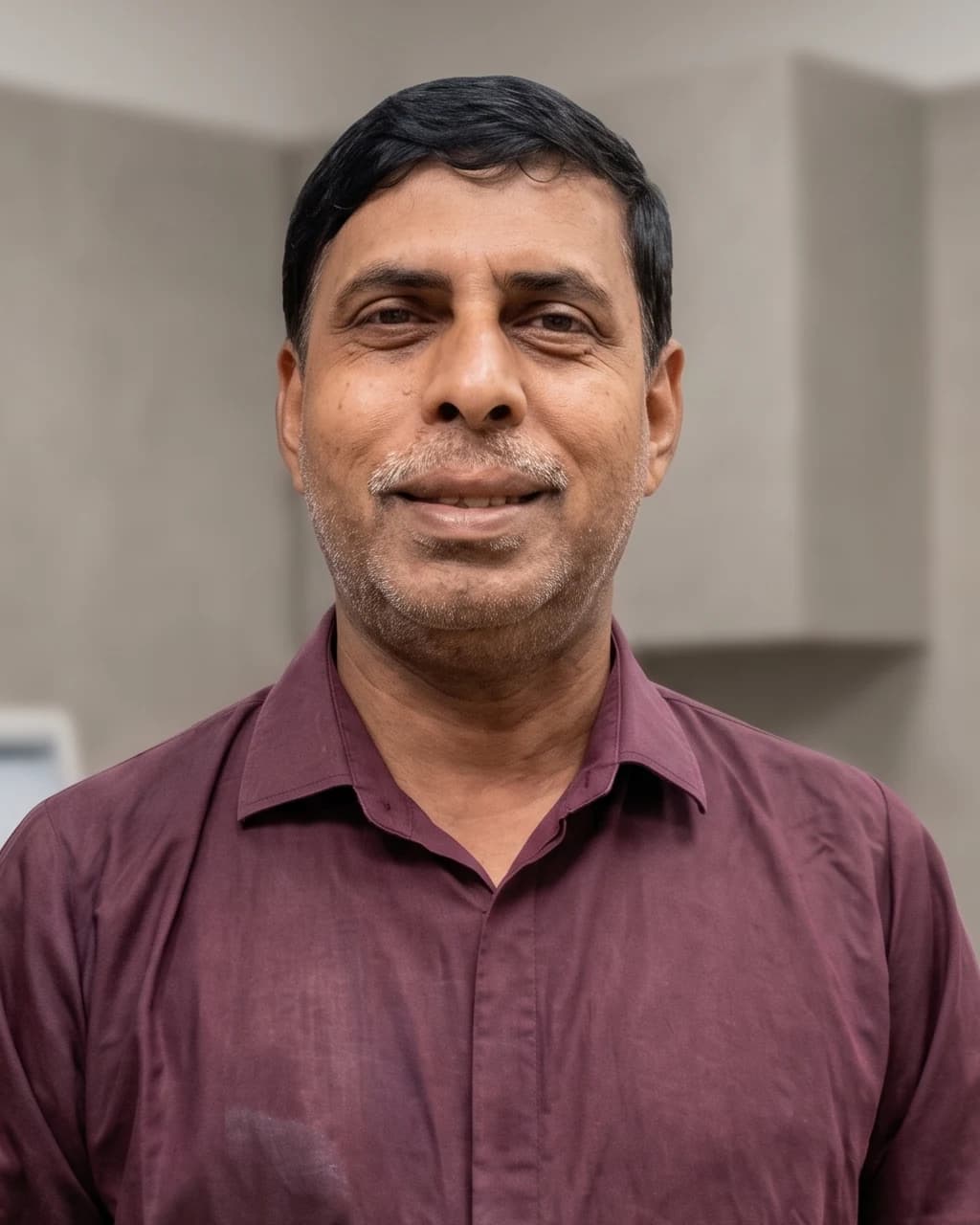 Md. Didar Hossain, Senior Laboratory Technologist, in the pathology laboratory at Dhaka Clinic & Nursing Home, Tangail